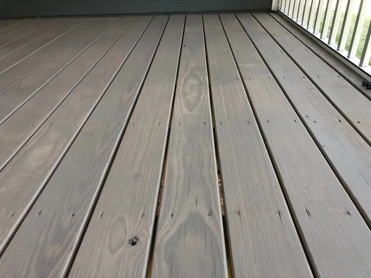 Gray semi-transparent stain on deck boards