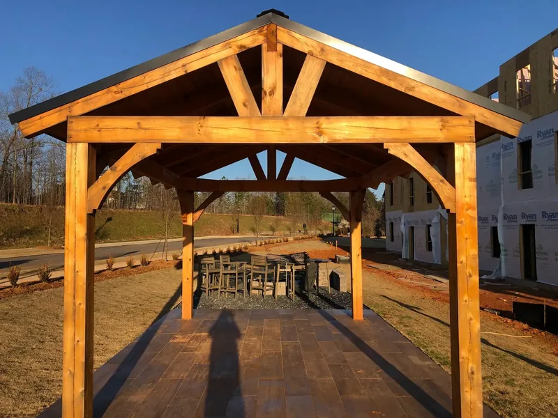 Newly stained timber-frame pavilion