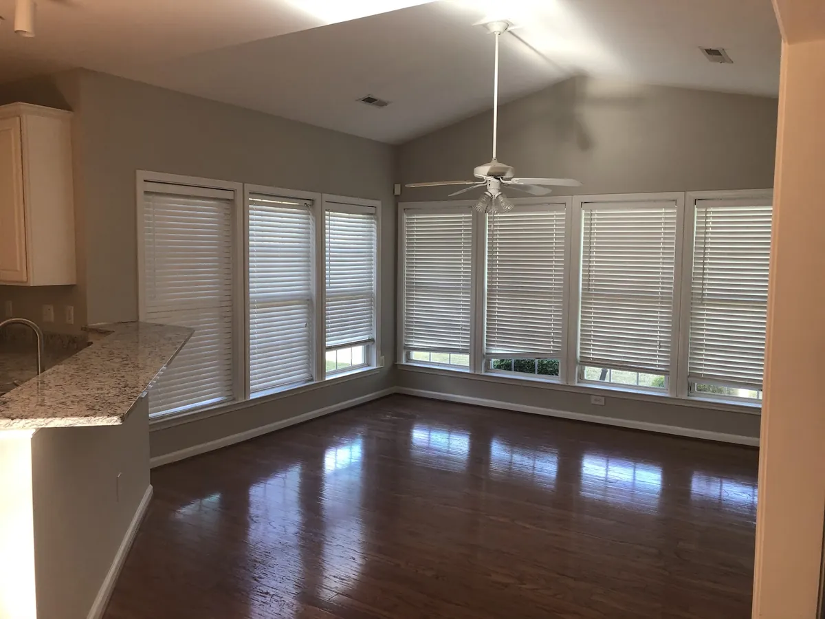 Sunroom with freshly painted walls and window trim